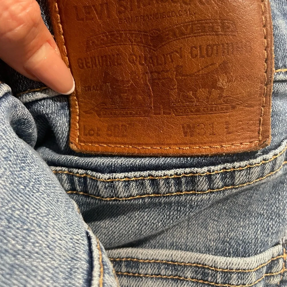 Levi's 502👖Men Premium Taper Fit Jeans with Vintage-Inspired Fading,size 31x32